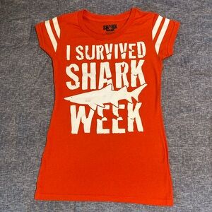 For sale is a novelty Shark Week T-shirt. Size is small, 3-5.